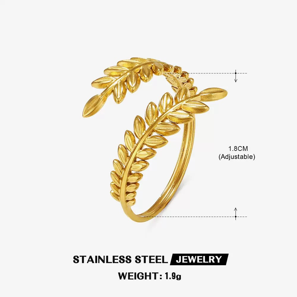 Gold leaf ring with measurements and material details on a white background